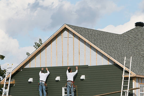 Professional Siding Replacement technician working in Balsam Grove, NC